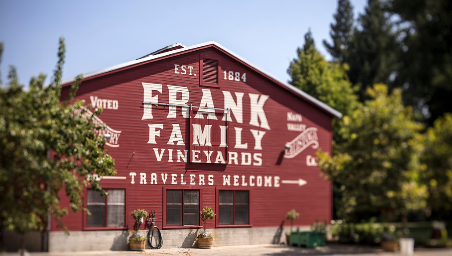 image shows the front of Frank Family Vineyards red barn